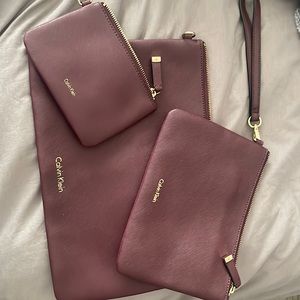 Calvin Klein leather purses and laptop case in burgundy